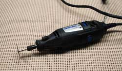 Dremel with a cut-off wheel